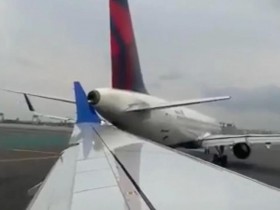 【蜗牛棋牌】两客机在美机场发生轻微碰撞