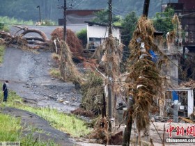 【蜗牛棋牌】日本暴雨已致72人死亡 安倍赴灾区为遇难者祈祷