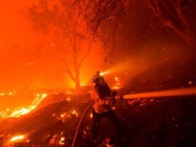 【蜗牛棋牌】美国山火有害烟雾影响北美大片地区，还飘到欧洲