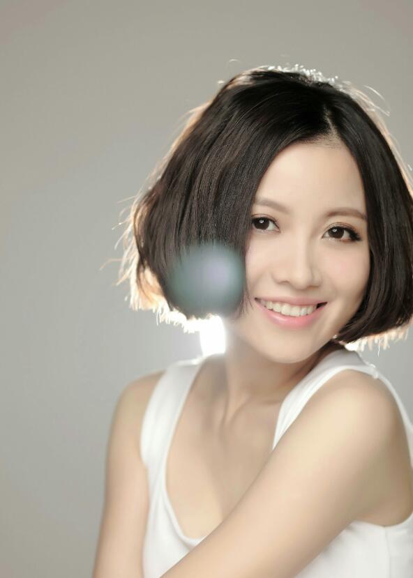 【蜗牛棋牌】姚贝娜 中国内地流行乐女歌手美照分享及个人资料