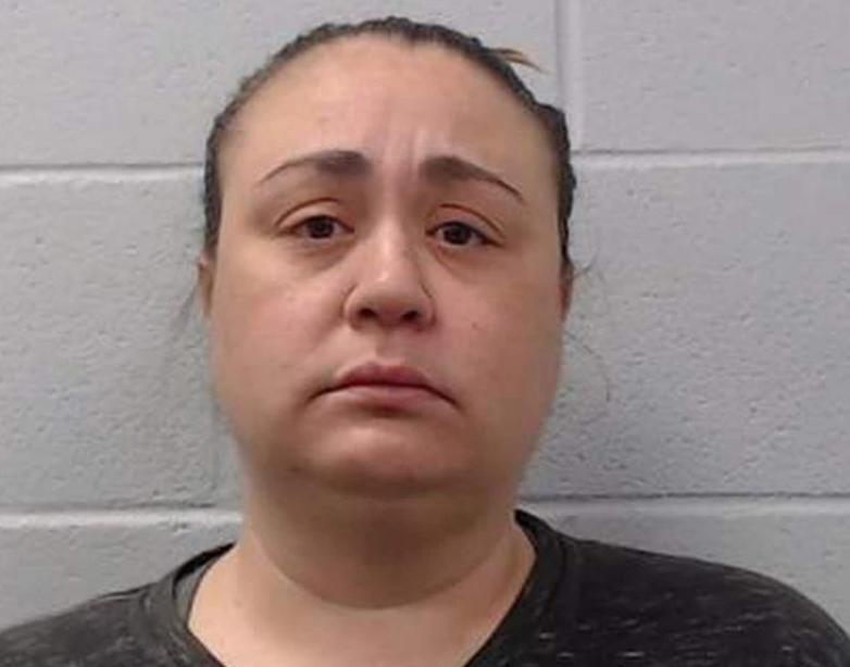 美国女子用枪指7岁儿童被捕 只因不想给糖