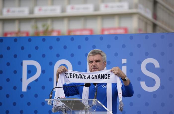 【蜗牛棋牌】“奥林匹克休战墙”揭幕 运动员在奥运村呼吁世界和平